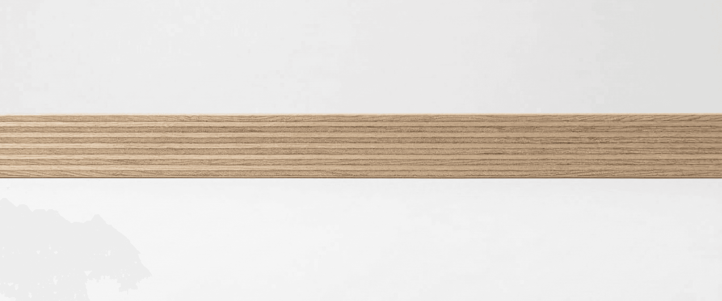 Plywood pegboard detail — plies visible on edge